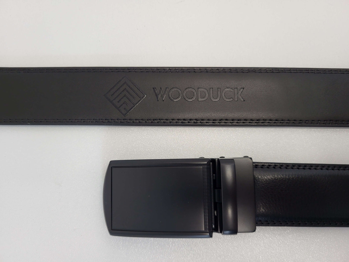 <tc>Ceinture homme en cuir avec boucle à verrouillage automatique</tc>